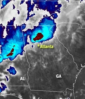 Satellite Image Satellite image taken Monday morning, September 21. Blues and Reds show the location of the heaviest rainfall when the image was taken.